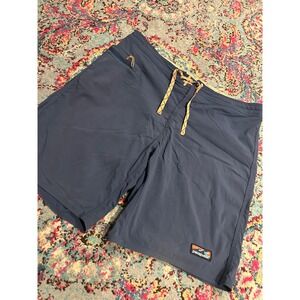 Patagonia Mens Navy Blue Board Shorts Swim Trunks Size 36 Side Pocket Wave Logo